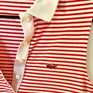 Red and white Lacoste sleeveless top. Fits perfectly.